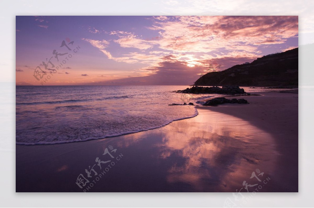 夕阳海滩背景图片