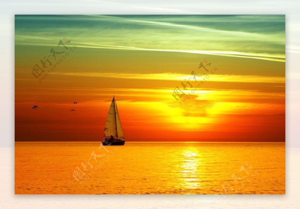 唯美夕阳帆船风景图片