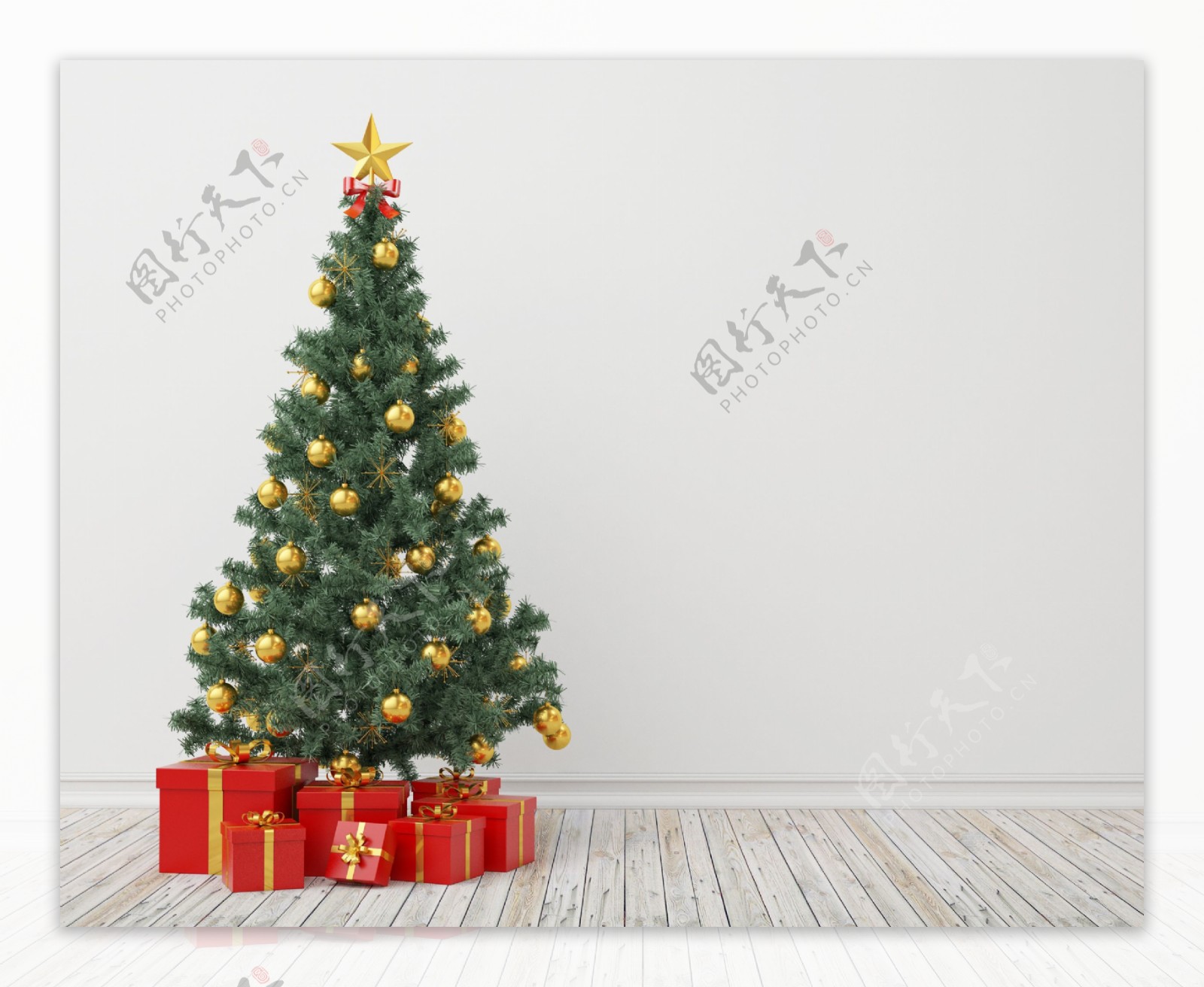 地板上的圣诞树和礼品盒图片