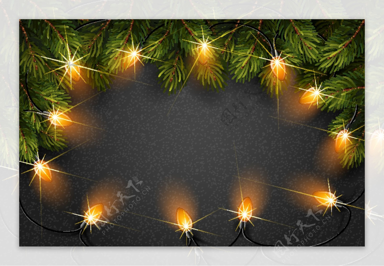 圣诞松枝和彩灯背景图片